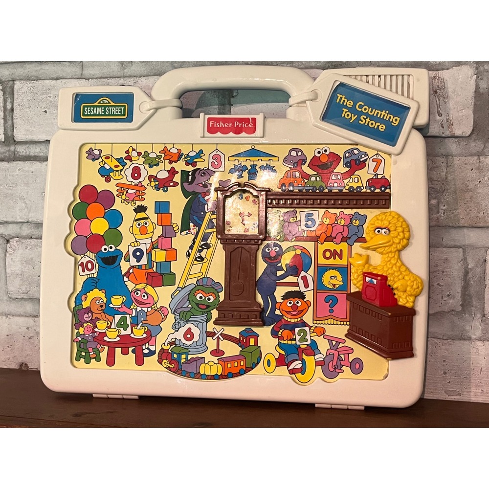 Vintage Fisher-Price Talk'n Teach Tag Along Sesame Street The Counting Toy Store